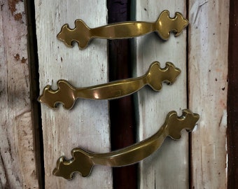 Set of three vintage brass? drawer pulls