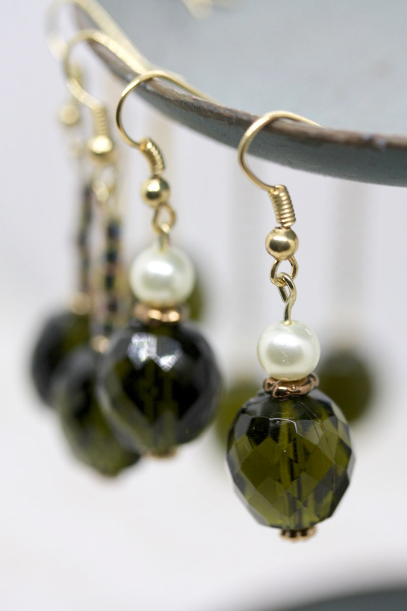 Your choice of handmade upcycled earrings findings and ear wires made of vintage faceted olive green dangles combined with new beads