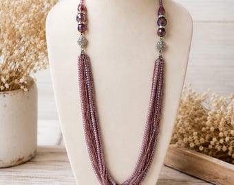 Stunning multi strand shades of purple crystal beaded necklace