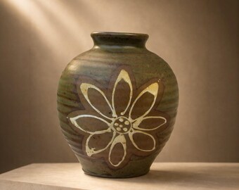 Charming vintage pottery vase with large flower