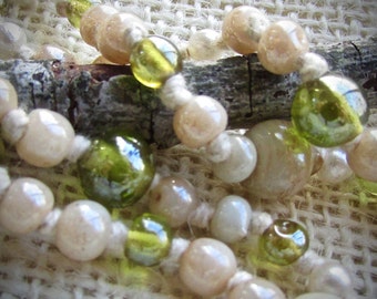 Cream and green glass beaded vintage necklace - hand knotted