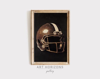 May include: A framed print of a brown football helmet with a white stripe and a black face mask. The helmet is set against a dark background.