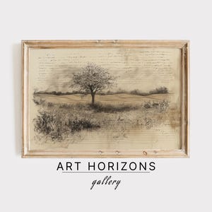 May include: A black and white drawing of a tree in a field, framed in a light wood frame. The drawing is on top of a sheet of paper with handwritten text.