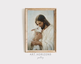May include: A framed painting depicting a man with long hair and a beard holding a white lamb in his arms. The man is wearing a white robe and the lamb is looking up at him. The painting has a light blue background.