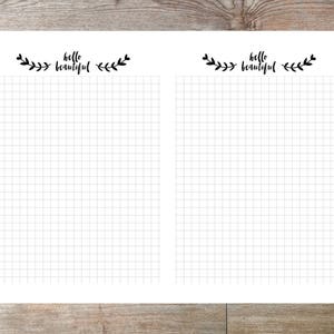 May include: A printable sheet with two blank grid pages. Each page has the text "hello beautiful" with a simple floral design above it.