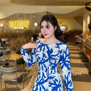 LAM VU Ao Dai Lua Thai Tuan Blue color/ Ao Dai Design with Print Flowers/ Traditional Long dresses Vietnamese /pants included/ G334