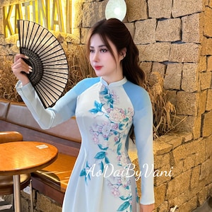MOC CHAU Set Ao Dai Lua Thai Tuan Light Blue color/Ao Dai Design with Print Flowers/Traditional Long dresses Vietnamese/pants included/G335