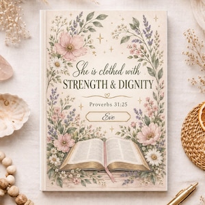 Peut inclure: Un livre rectangulaire à couverture crème orné d'une bordure florale de fleurs roses et violettes. Le texte indique : She is clothed with STRENGTH & DIGNITY, Proverbs 31:25, et le prénom Eve. Une illustration de livre ouvert est centrée.