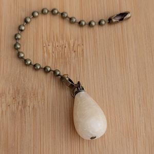 Onyx Ceiling Fan Pull: Brass Pull Chain, Warm Natural Neutrals of White & Beige