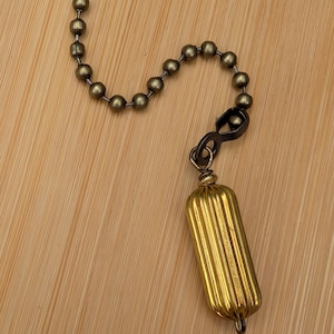 Vintage Ribbed Brass Chain Pull: Retro Fan/Light Accent, Fluted Hardware