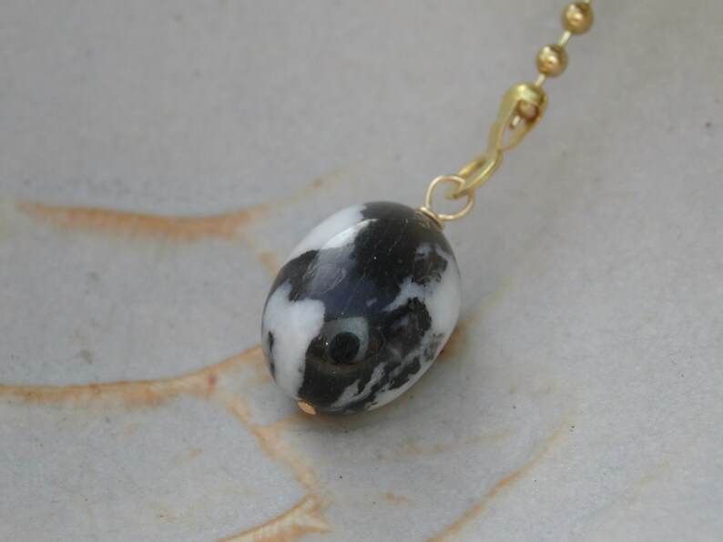 Fan Dangle Tumbled Pebble on Brass Light Pull Switch Single Black White Polished