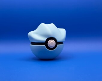 May include: A light blue Poke Ball with a black ring and a white button in the center.
