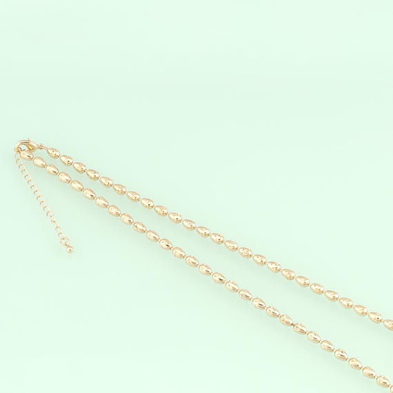 Collier Chaîne Boules Ovales - Métal Doré - Longueur 42 Cm - Poids 18 G