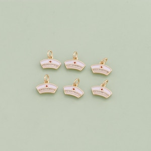 May include: Six gold-toned nurse hat charms with white enamel and a red cross. The charms are ideal for adding a touch of medical flair to jewellery or crafts.