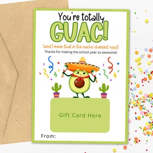May include: A gift card with a green border and the words "You're totally GUAC!" in large, colorful letters. An avocado character wearing a sombrero is featured. Includes a brown envelope and confetti.