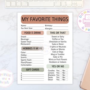 May include: A printable "My Favorite Things" list on white paper with a light brown header and sections. The list includes prompts for food, hobbies, and gift cards. A keyboard, phone, and pen are in the background.