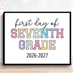 May include: A rectangular sign with a black border featuring the text first day of in black script, followed by SEVENTH GRADE in colorful block letters including pink, yellow, blue, and purple, with the school year 2026-2027 printed in black below.