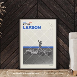 May include: A black and white poster with a photo of Kyle Larson, a race car driver, celebrating a win. The poster has the text "Kyle Larson" and "1992" on it.