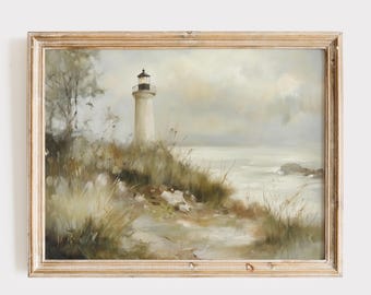 May include: A framed painting of a white lighthouse on a rocky coastline with a cloudy sky and a choppy sea in the background.
