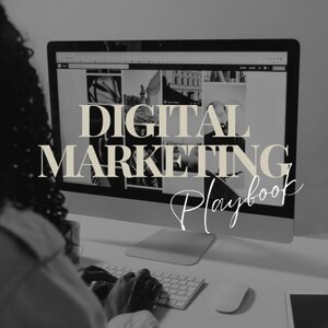 May include: A black and white image of a person working on a computer. The computer screen displays the text "Digital Marketing Playbook".