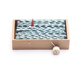 Tiny nautical kinetic sculpture sailboat in bamboo box art for small space