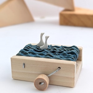 Kinetic sculpture wooden swans automaton