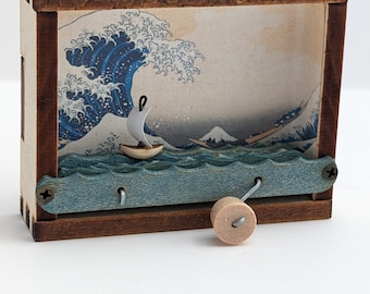 Grote golf Illustratie Kinetic Sculptuur Zeilboot Automaat Hokusai Tsunami Japanse kunst