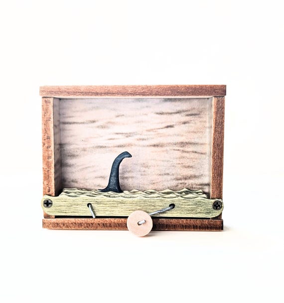 Handcrafted Nessie Kinetic Sculpture: Loch Ness Monster Desk Art
