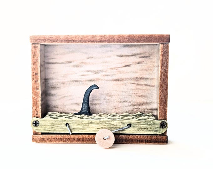 Handcrafted Nessie Kinetic Sculpture: Loch Ness Monster Desk Art