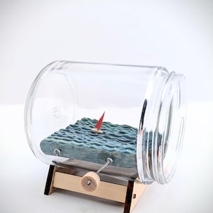 kinetic sculpture hand crank ship in a bottle nautical decor