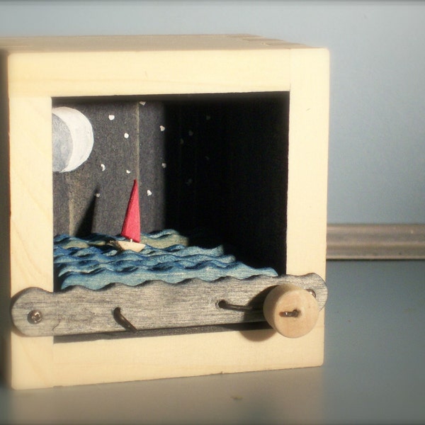 red sailboat at night automaton