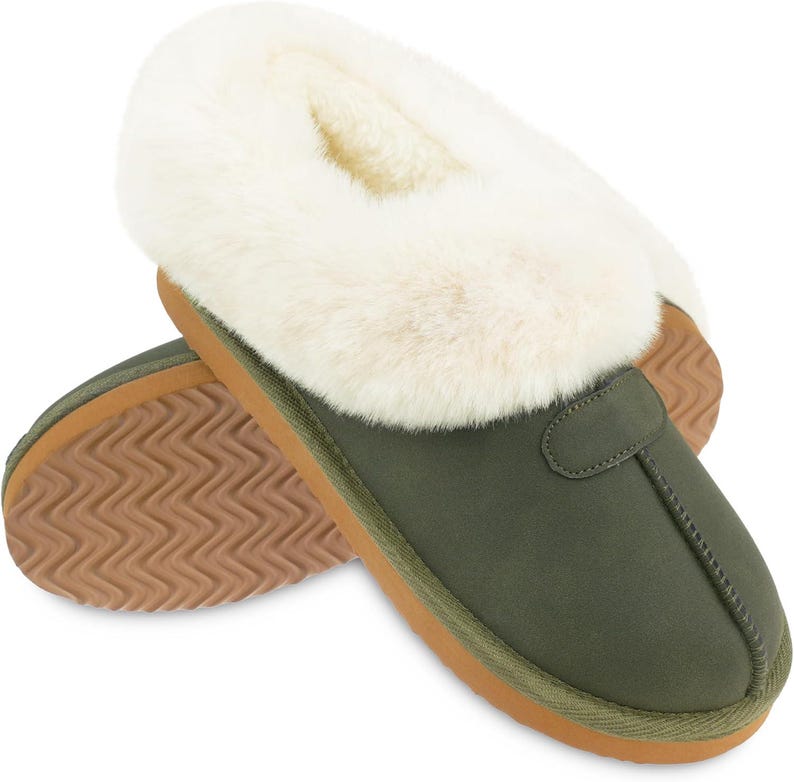 May include: Green suede slippers with a faux fur trim and a brown rubber sole.