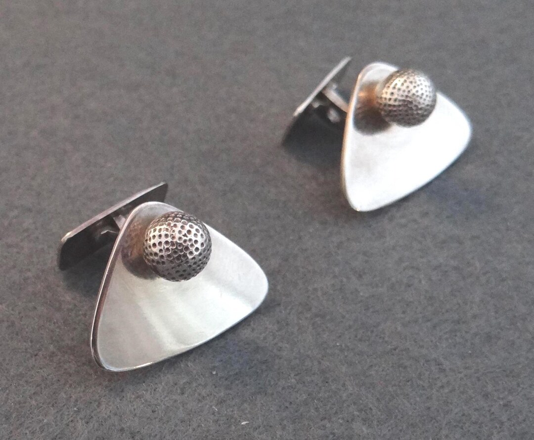 Boutons de manchette vintage : l'accessoire chic pour une élégance
