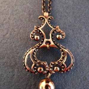 Vintage HANNU IKONEN bronze pendant and chain FINLAND