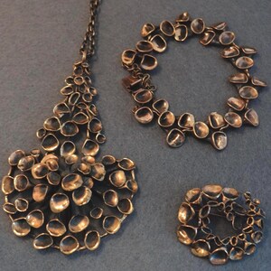 SET Hannu Ikonen bronze bracelet, necklace, brooch Finland