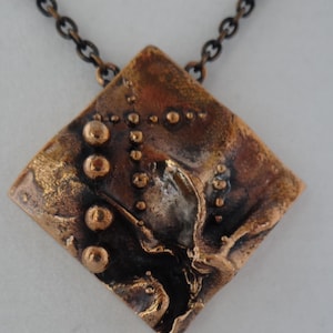 vintage HANNU IKONEN bronze pendant and chain FINLAND