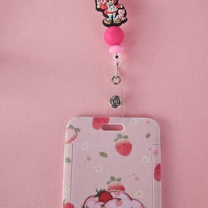 Strawberry Shortcake badge reel with the badge holder.