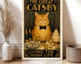 May include: A framed art print featuring a ginger cat in a tuxedo, with the text "THE GREAT CATSBY LIVING THE HIGH LIFE." The cat is surrounded by champagne bottles, oysters, and a tiered cake, in an art deco style.