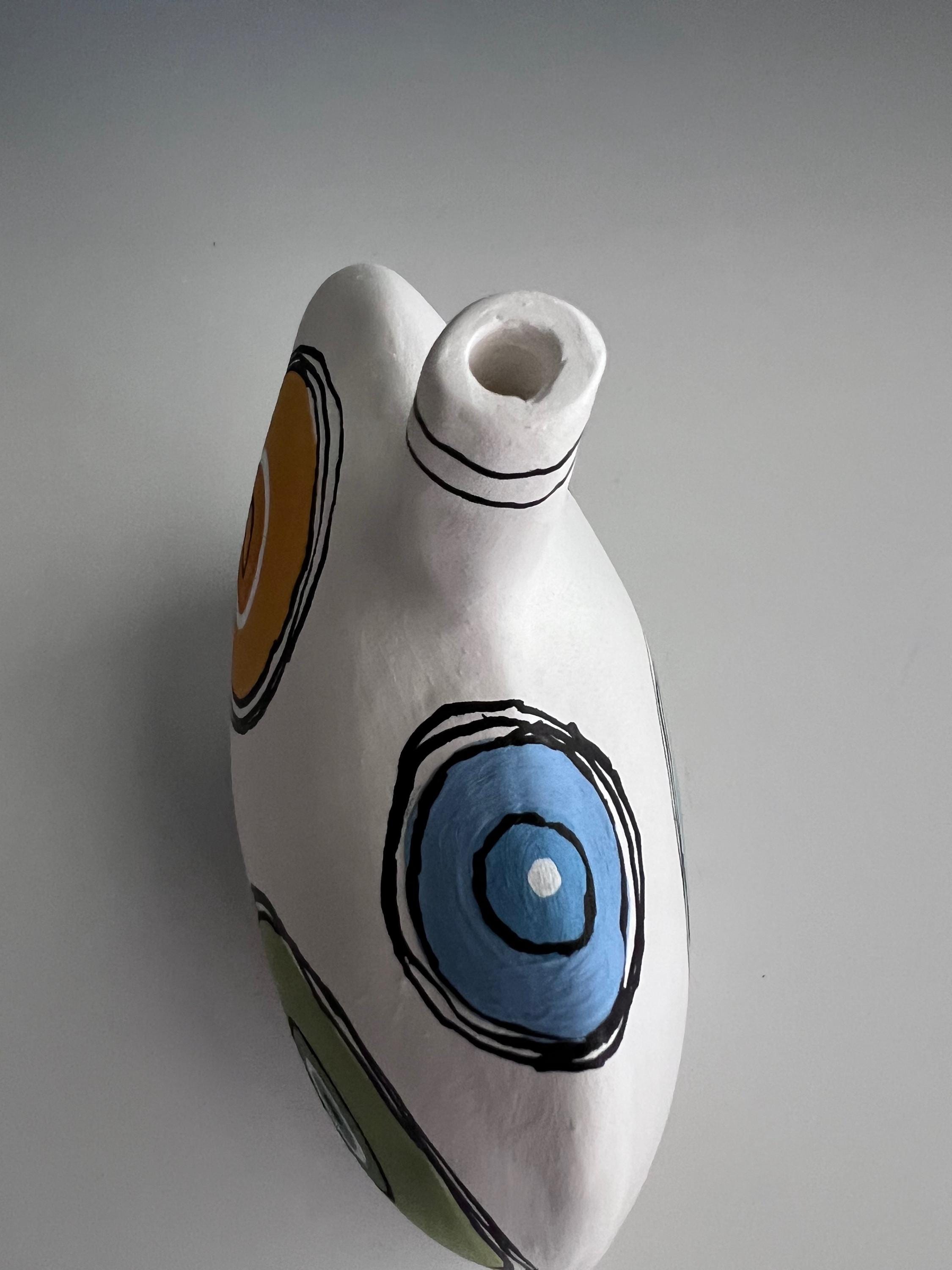 手描きの陶器の花瓶：カラフルな円形デザイン、装飾ボトル - Etsy 日本