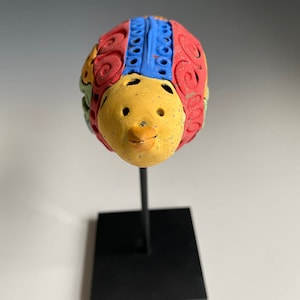 Handmade Ceramic Bird Sculpture: Whimsical Painted Clay Art