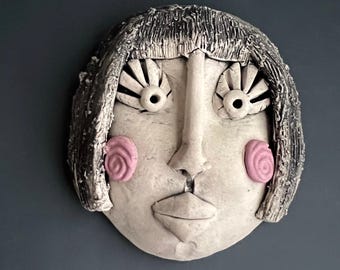 Hand Sculpted Ceramic Face Wall Art: Black and White with Pink Cheeks