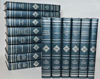 May include: A collection of The Harvard Classics, Collector's Edition books. The books have dark blue covers with silver lettering and decorative diamond patterns. Titles include "American Historical Documents" and "Emerson."