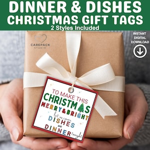 May include: A wrapped gift with a white ribbon and a Christmas gift tag. The tag reads "TO MAKE THIS CHRISTMAS MERRY & BRIGHT let us cover DISHES AND DINNER tonight." The gift box is brown and the tag has a red border.