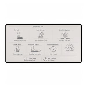 May include: A rectangular Pilates desk mat with a black border and a light gray interior. The mat features illustrations and instructions for various exercises, including spinal twists and hamstring stretches. Text includes "Pilates Desk Mat".