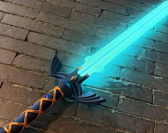 May include: A replica sword featuring a glowing cyan blade and a dark gray hilt with orange cross-hatching. The handle includes a small blue circular accent near the crossguard, which has wing-shaped extensions on both sides of the blade base.