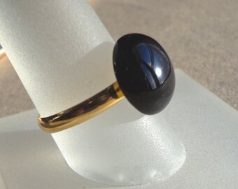 Ring, black onyx gemstone, 13x5mm, adjustable brass base