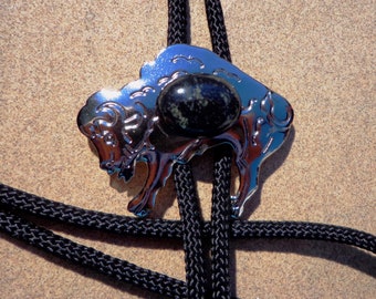 bolo tie, buffalo concho, serpentine gemstone, etched tips