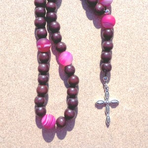 rosary, Lutheran, silver tone cross, brown wood, pink agate