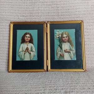 Antieke kind Maagd Maria en kind Sint-Anna ingelijste oude heilige kaarten, antieke gouden lijst die kan worden opgevouwen.