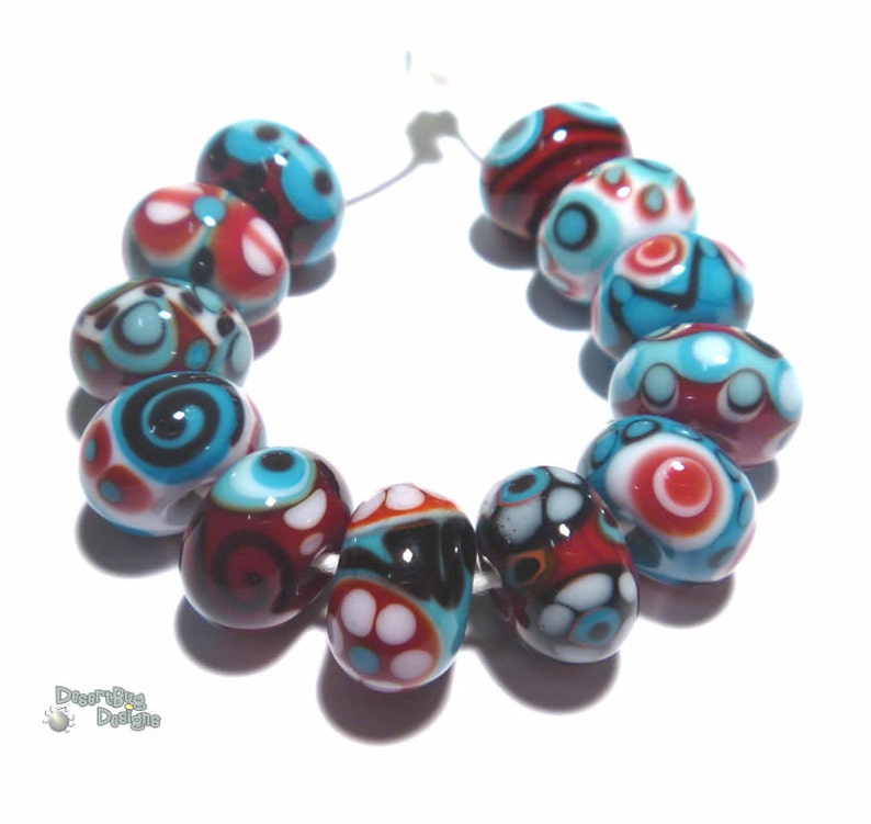 SANTA FE Handmade Lampwork Beads Red Turquoise Blue White Black Desert Bug Designs 12 Detailed Bright Beads